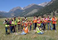 volunteers cleaning up outdoors